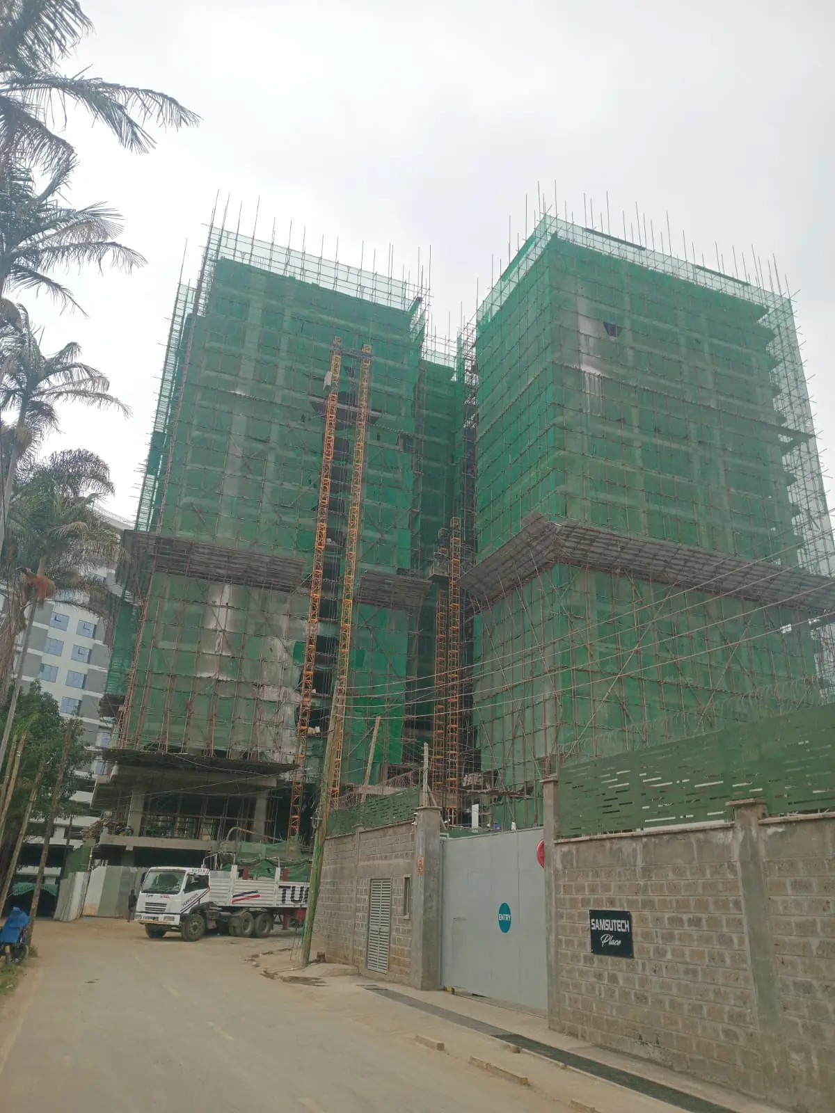 Capital Heights in Westlands under construction, with scaffolding and green safety netting covering the apartment blocks.
