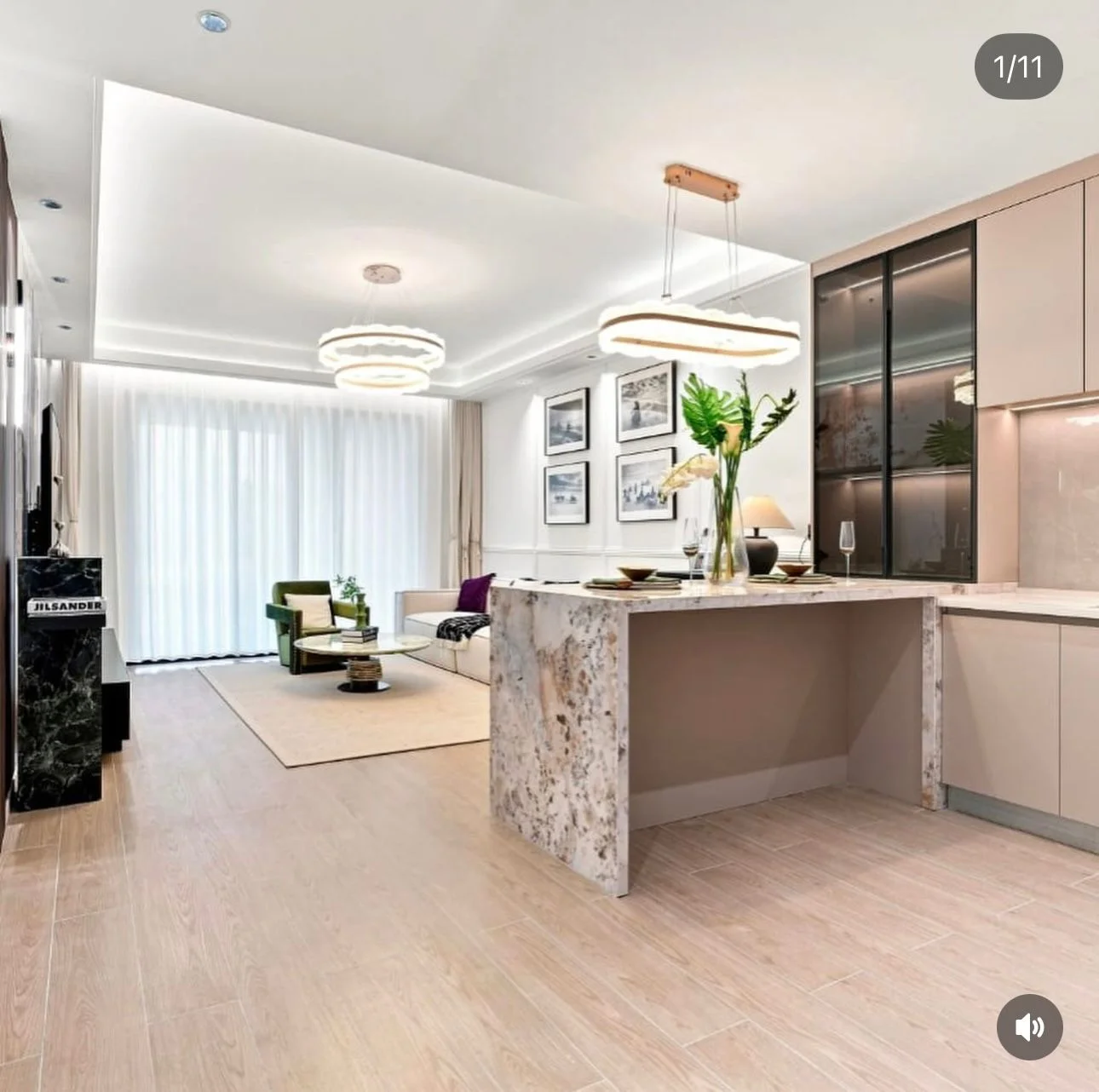 Open-plan living area at Capital Heights, Westlands, with a breakfast bar, pendant lights and sofa.