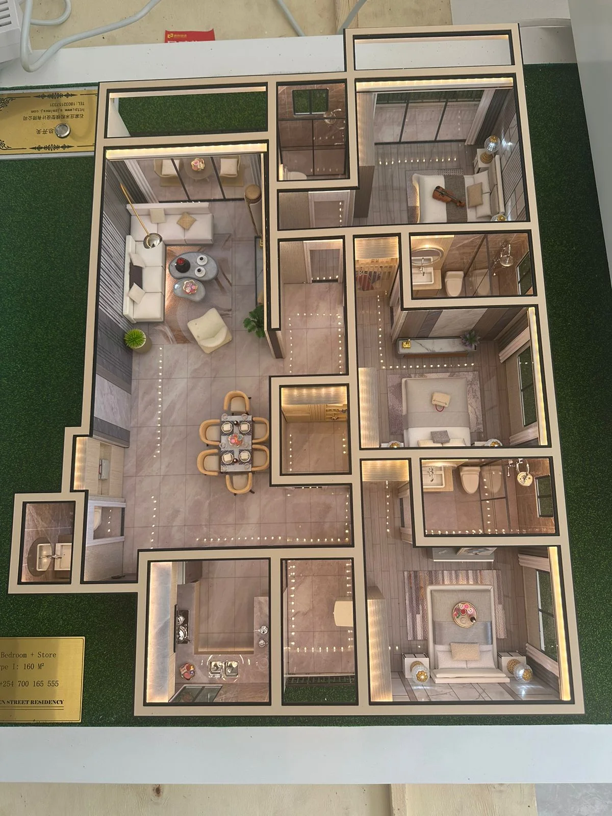 Overhead view of Golden Street Residency’s apartment model, showing bedrooms, kitchen, and living and dining areas.