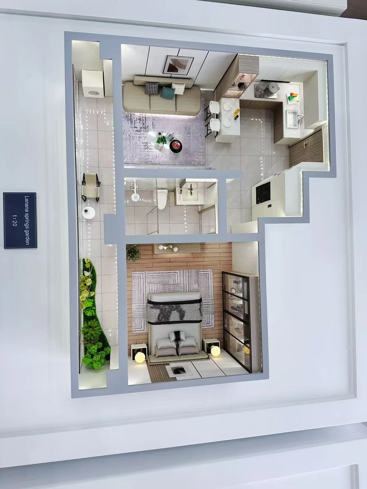 Overhead view of Lenana Springs Garden’s one-bedroom apartment model showing the living area, kitchen and bathroom.