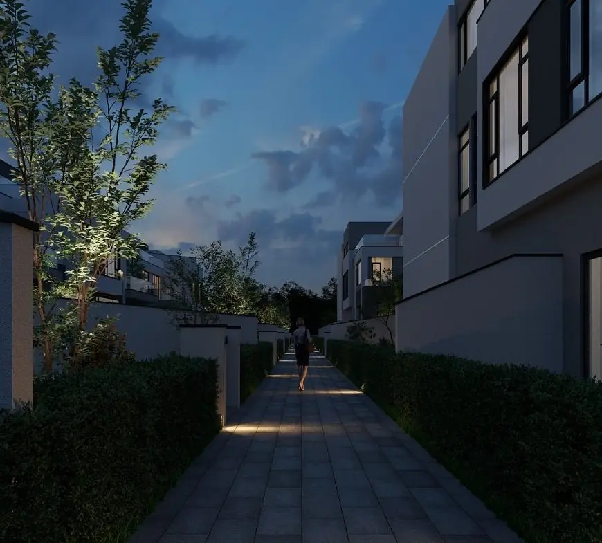 Dusk rendering of a lit, hedge-lined walkway between homes at Onlyou Njumbi Villas in Lavington.