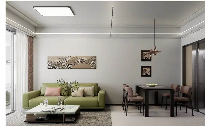 Living and dining area at Oxford Garden Kilimani with a green sofa, coffee table and dining set.