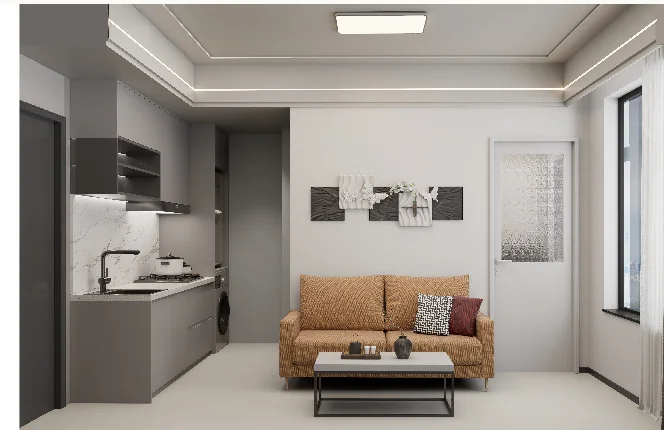 Studio interior rendering at Oxford Garden, Kilimani, with a sofa, coffee table and kitchenette.