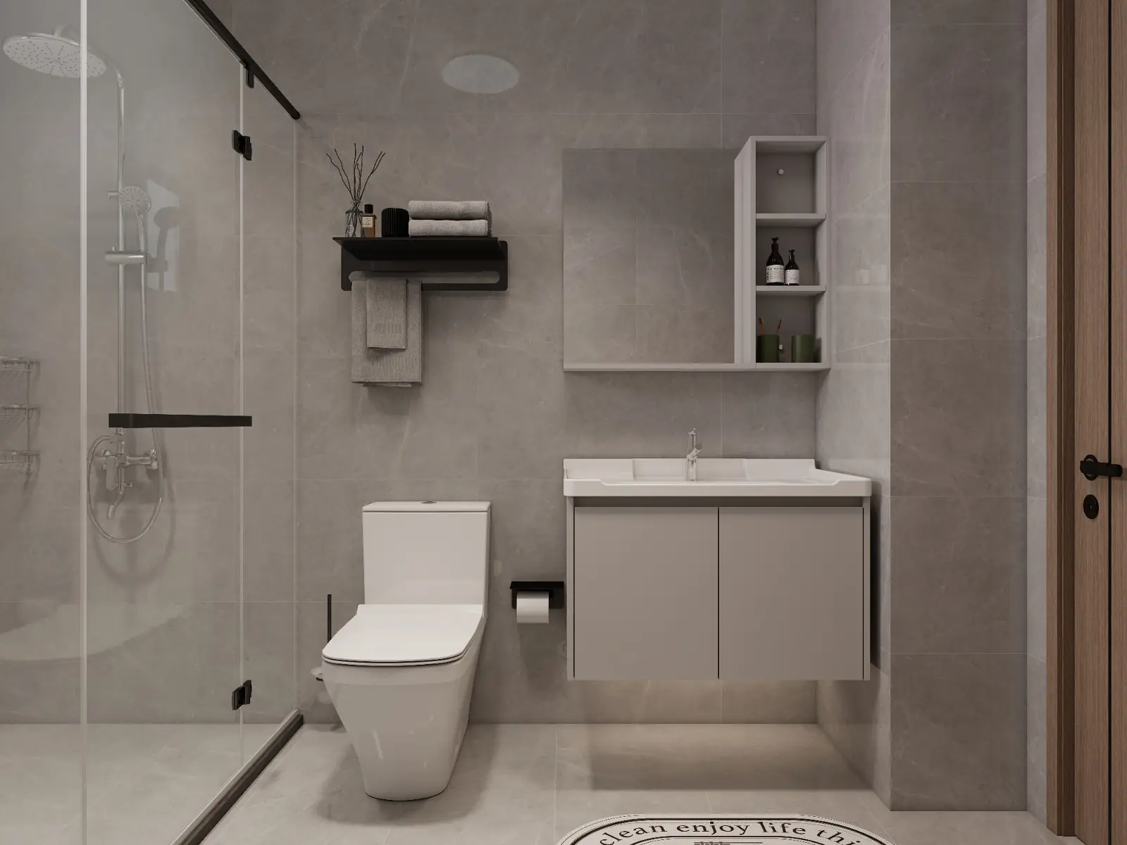 Bathroom at Oxford Homes Riverside with a glass shower enclosure, toilet and wall-mounted vanity.