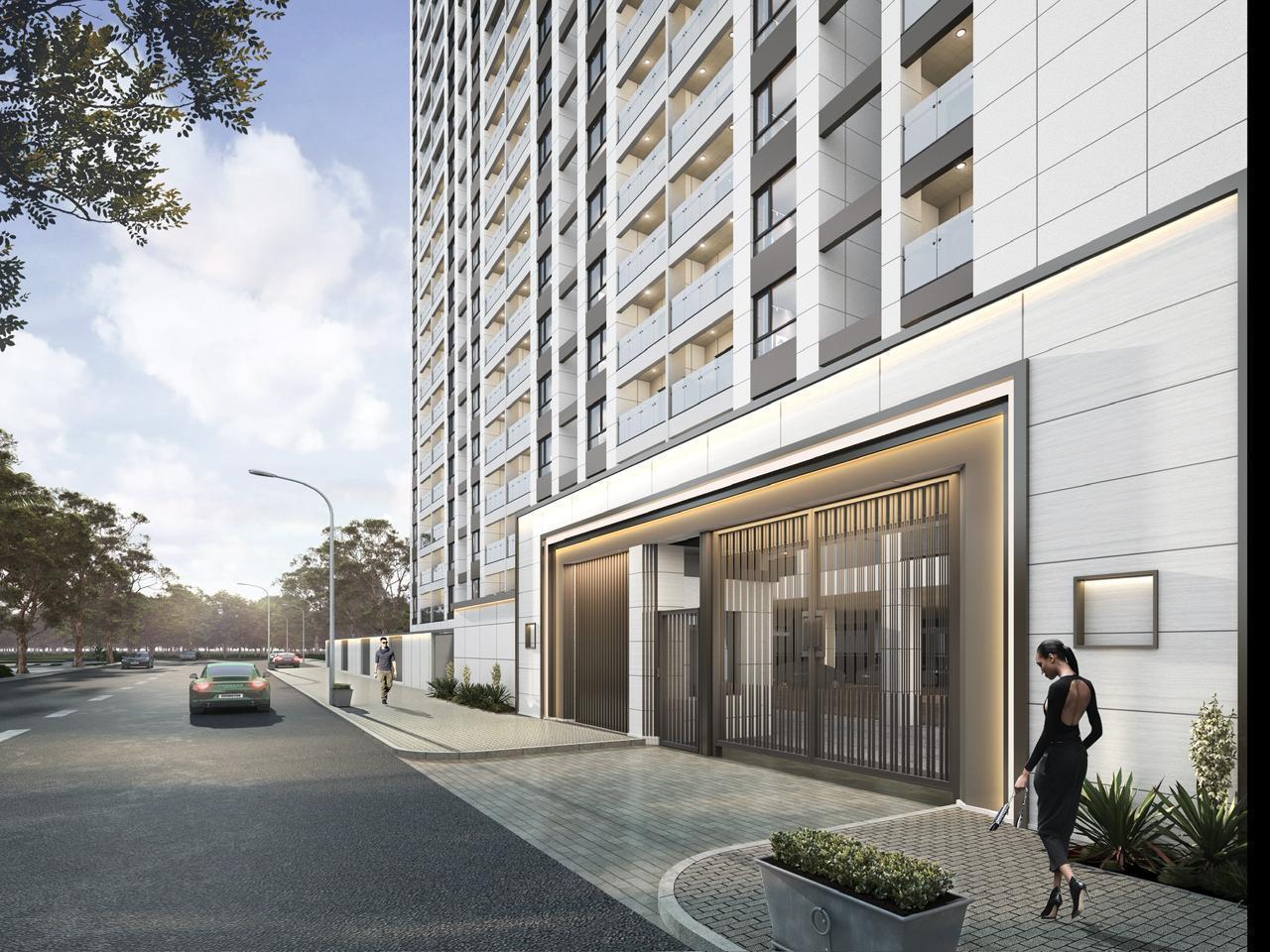 Architectural rendering of Oxford Homes Riverside showing a gated entrance, high-rise facade and rows of balconies.