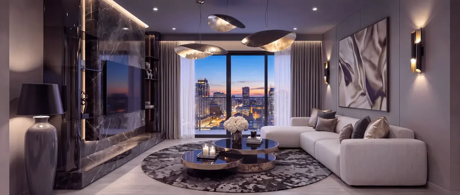 Living room at Spectre Residences, Westlands, with a sectional sofa, round coffee tables and skyline views.