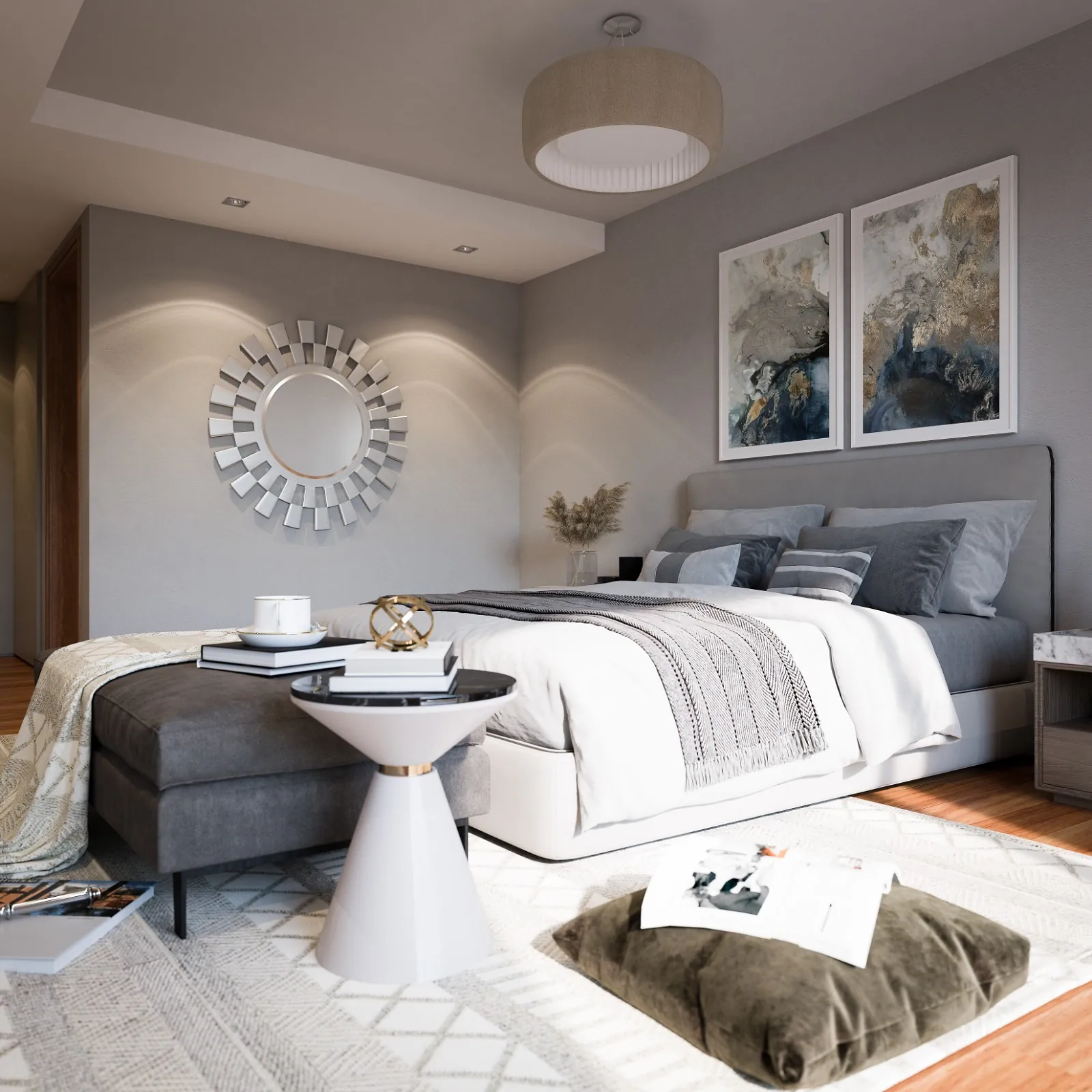 Bedroom at Sunstone Apartments with a grey upholstered bed, matching bench, circular mirror and framed artwork.