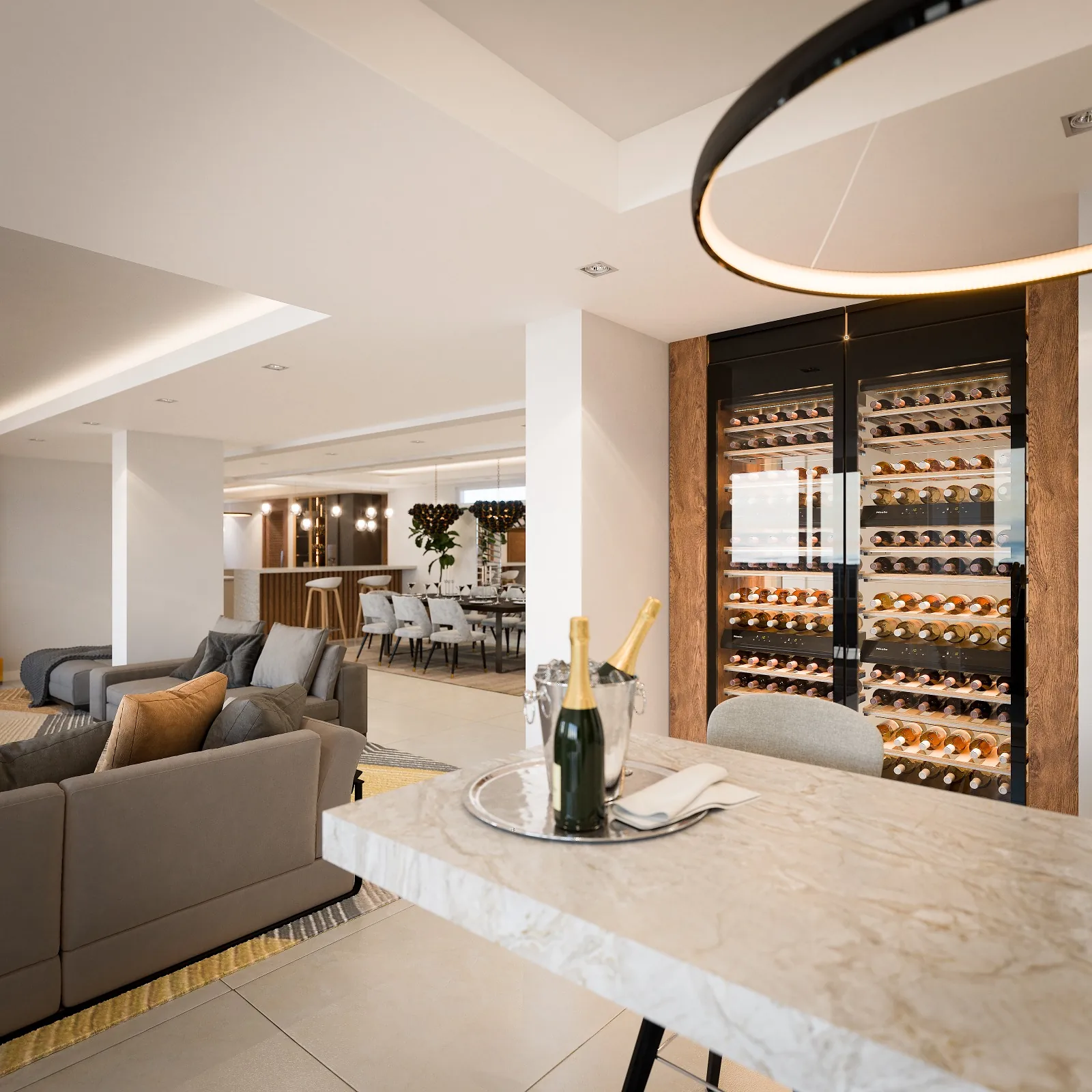Open-plan living and dining area at Sunstone Apartments, with grey seating and glass-fronted wine cabinets.